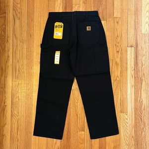 Carhartt loose fit, Men’s duck washed utility pants. New with tags. 32x30.